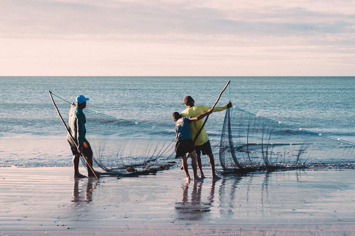 People fishing at the beach