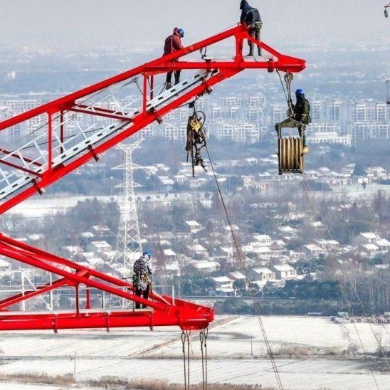 A woman carries water during a blistering hot day in New Delhi, India.
