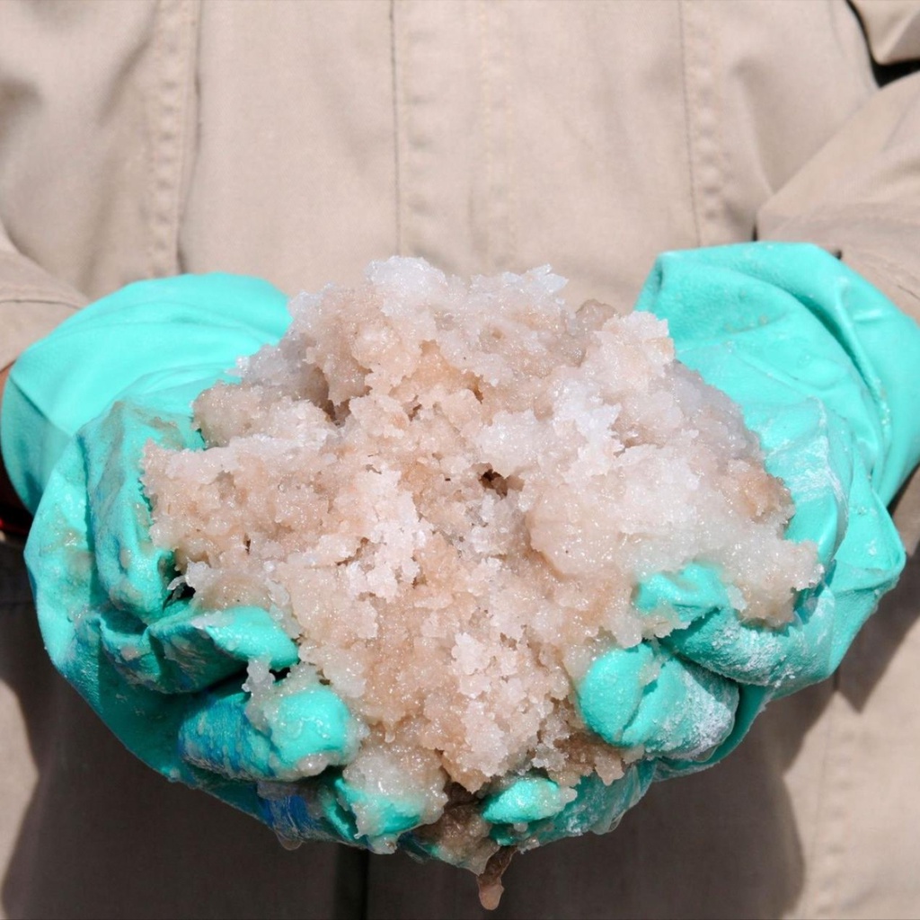 A woman carries water during a blistering hot day in New Delhi, India.